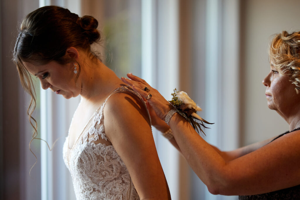 Yannis Malevitis photography - Mother assists the bride.