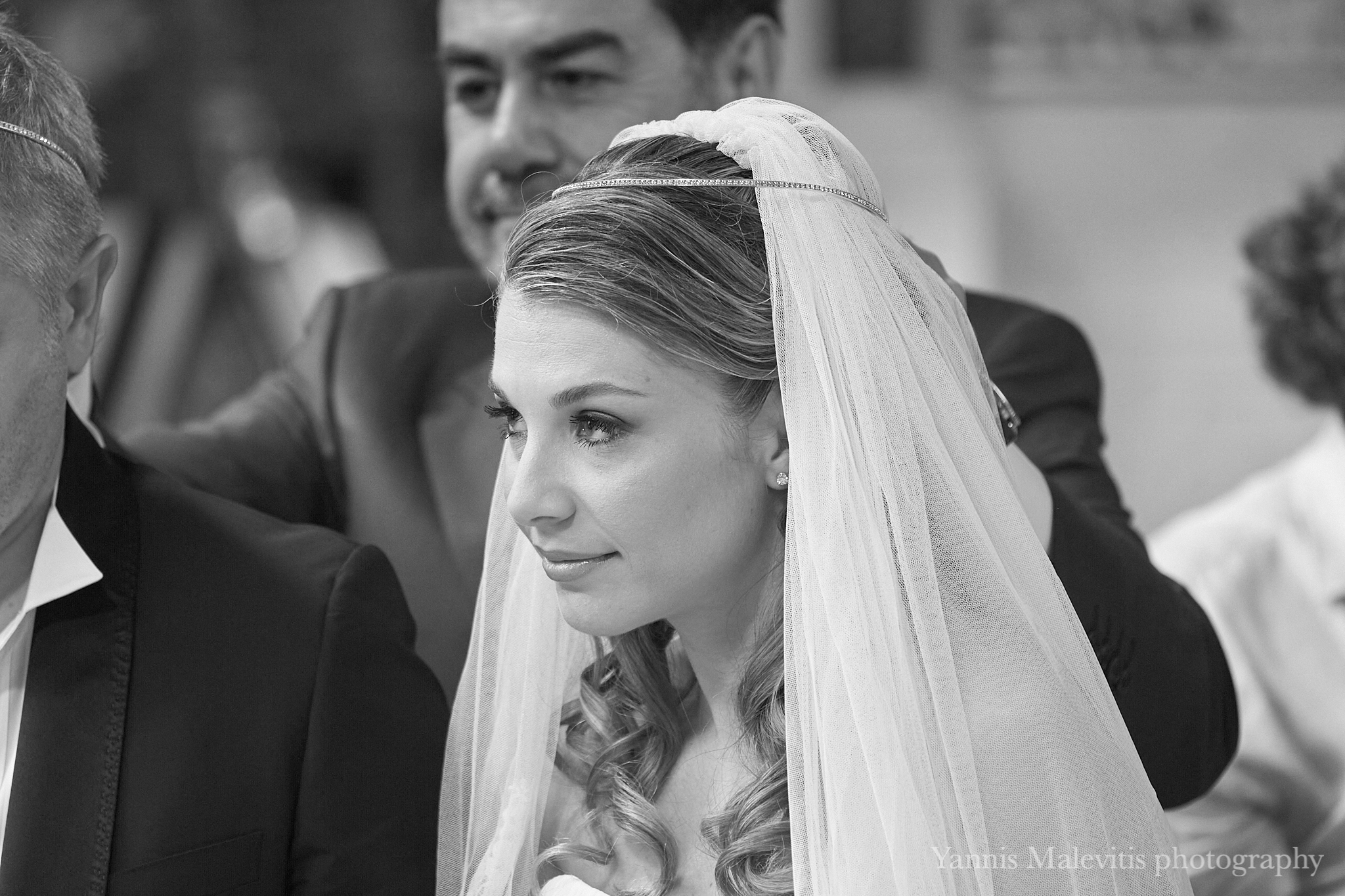 Photographing a wedding with a 200mm lens I feel closer to what the couple feels. 