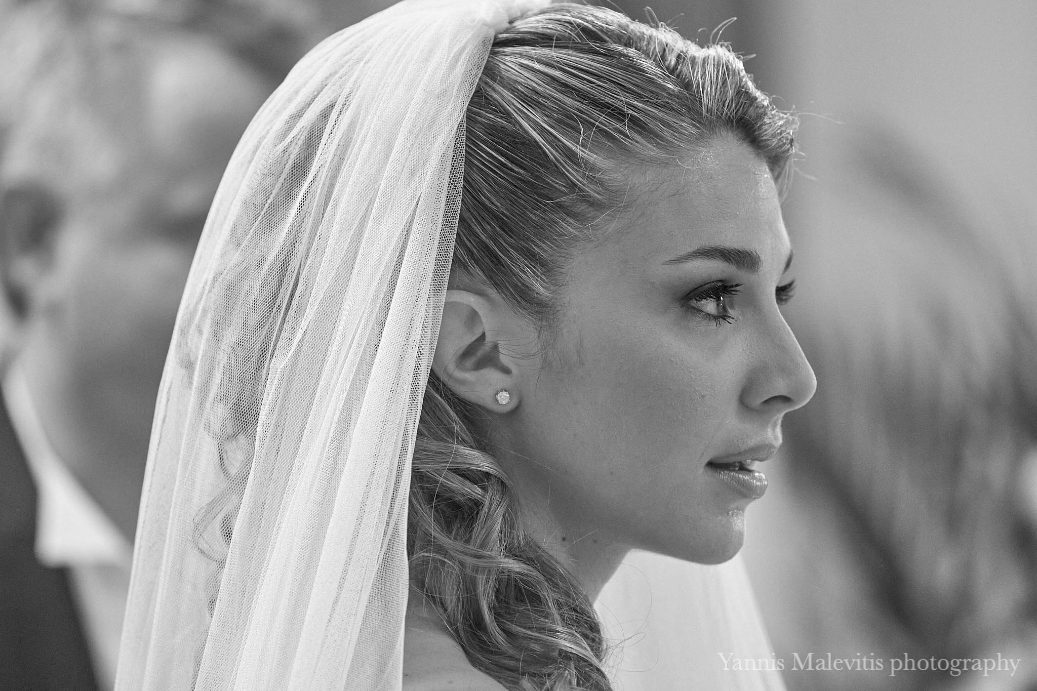 Photographing a wedding with a 200mm lens I feel closer to what the couple feels. 