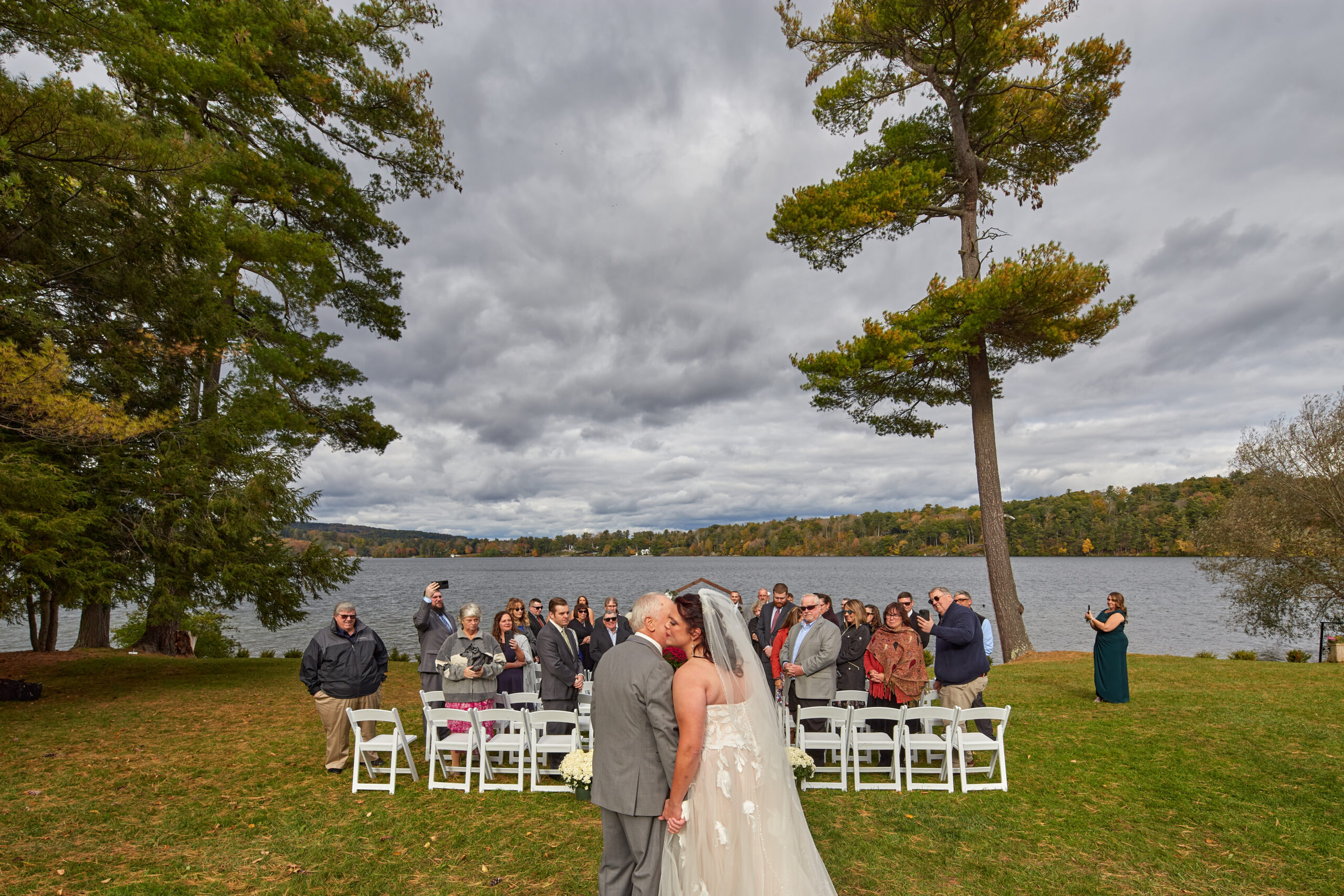Environmental portrait of the bride and her father