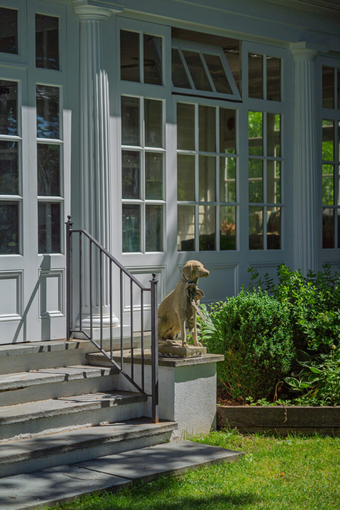 Stone dog statue outside the historic Mashomack estate in Pine Plains, New York